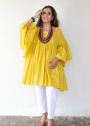 Model in Yellow A-line Frilled Dress