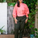 Model in Peach Embroidered Beetles Top posing front