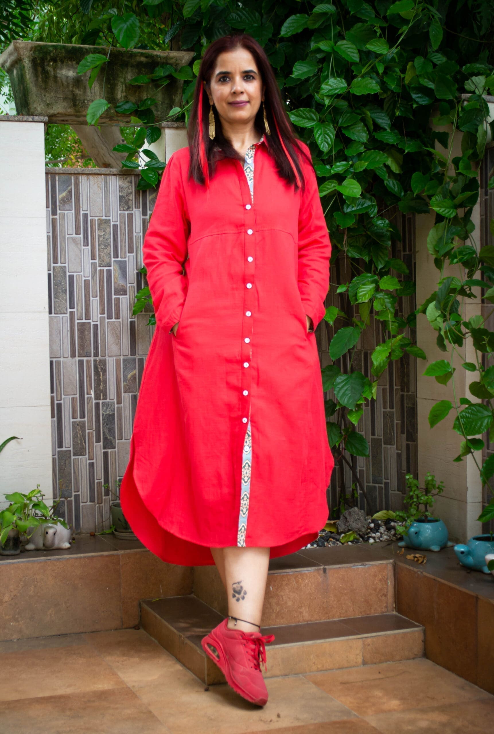 Model in RedPanelled Long Shirt Dress posing front